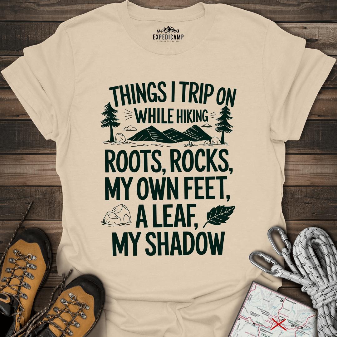 Things I Trip On While Hiking T-Shirt – Sand – Outdoor apparel for travel, hiking, camping, and nature lovers – ExpediCamp