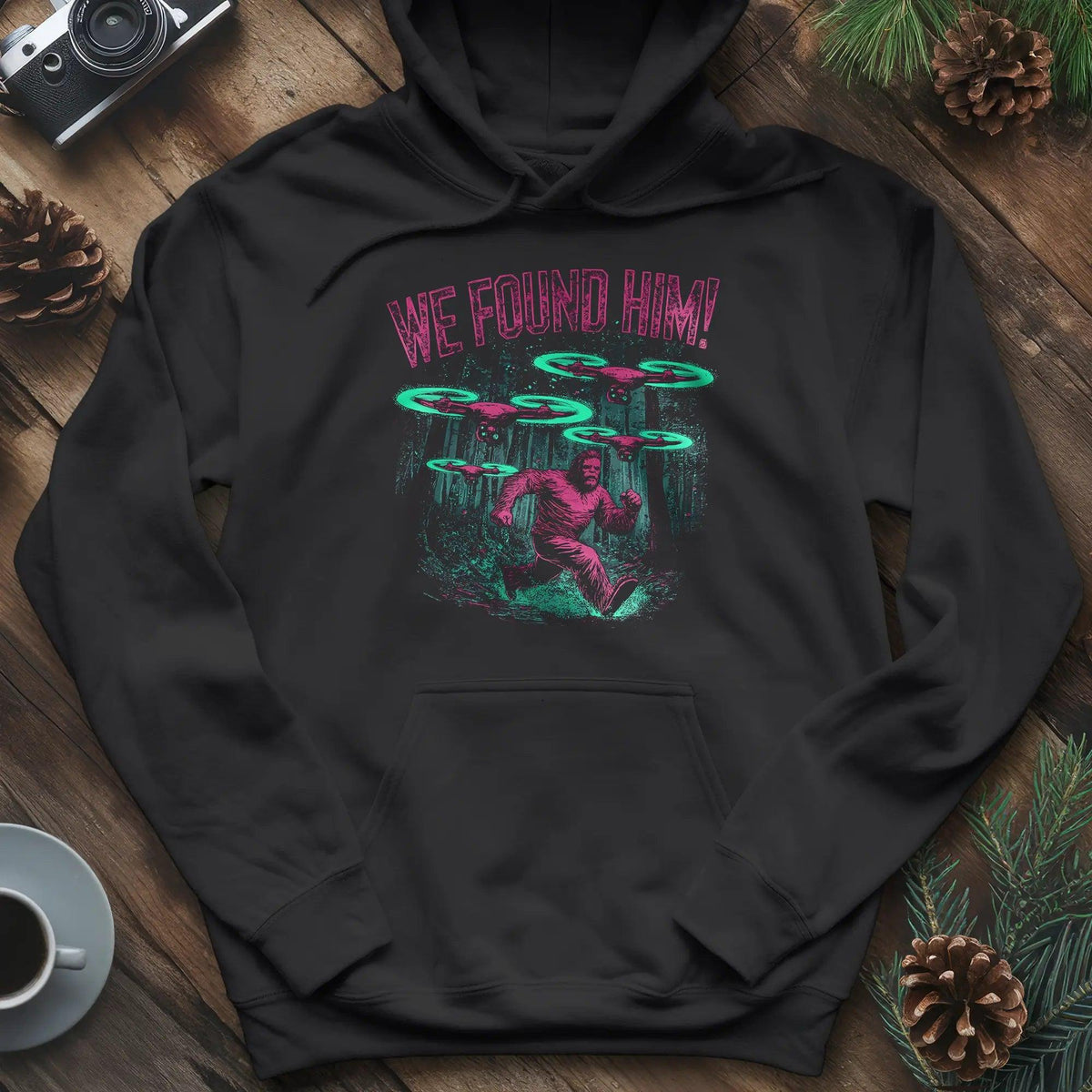 We Found Him Bigfoot Hoodie – Black – Outdoor apparel for travel, hiking, camping, and nature lovers – ExpediCamp